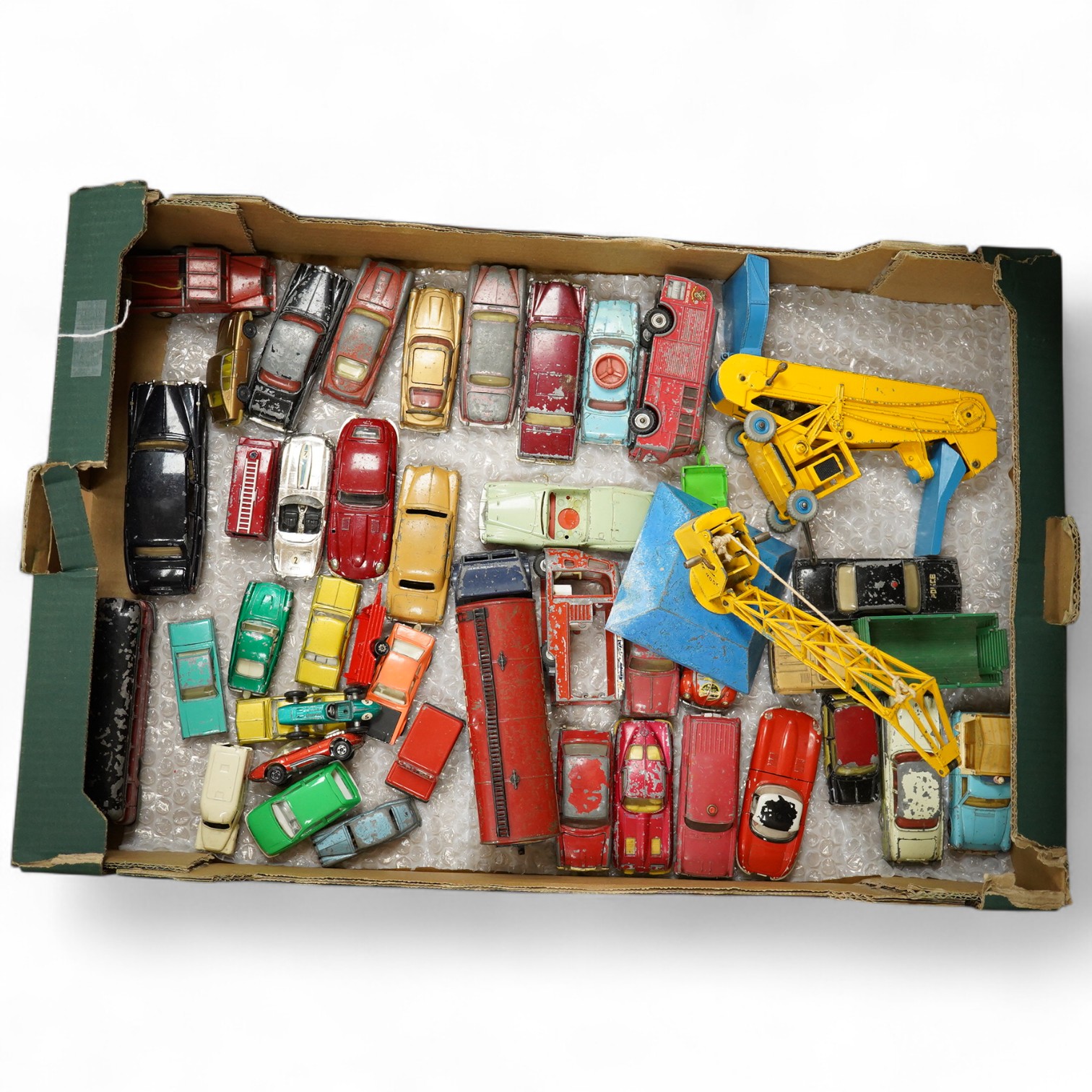 A collection of diecast vehicles by Dinky Toys, Corgi Toys and Matchbox Series, including; a Regent Tanker, Jaguar E type, Land Rover 109” WB, VW 1200 Saloon, Elevator Loader, Austin A60, etc. (c.42). Condition - poor to